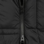 Close-up of a black puffer jacket with a zipper