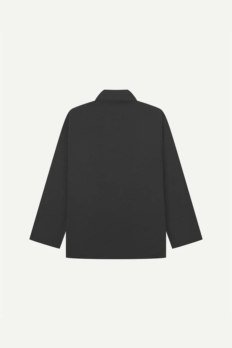 Charcoal shirt on a light gray background