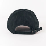 Black cap with a strap on a white background