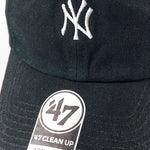 Black cap with white logo and '47' brand label on a white background