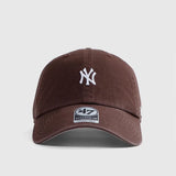 Brown baseball cap with a logo on a light gray background