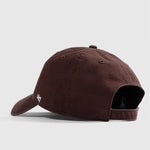 Brown baseball cap on a light gray background