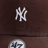 Brown cap with white logo and '47' brand emblem