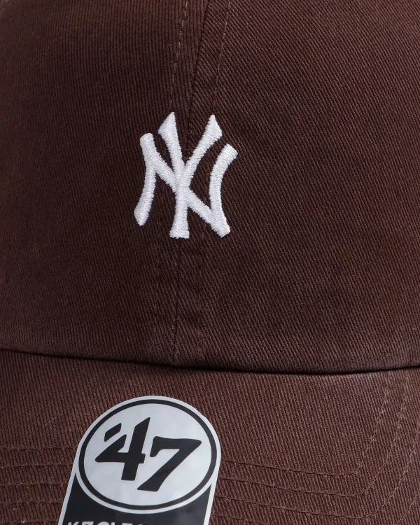 Brown cap with white logo and '47' brand emblem