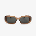 Sunglasses with brown frame and dark lenses on a white background