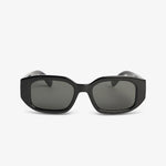 Black sunglasses with dark lenses on a white background