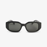 Black sunglasses with dark lenses on a white background