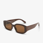 Brown sunglasses on a white background