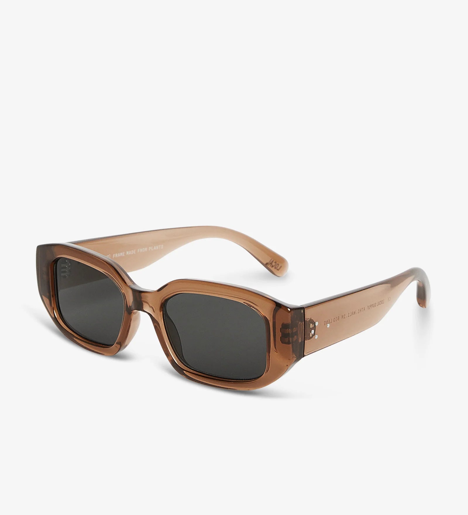 Brown sunglasses with dark lenses on a white background