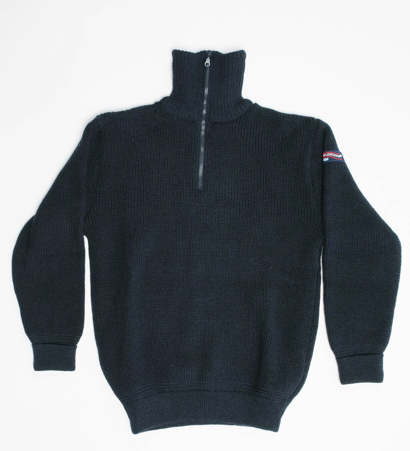 Blue half-zip sweater with a small logo on the sleeve against a white background
