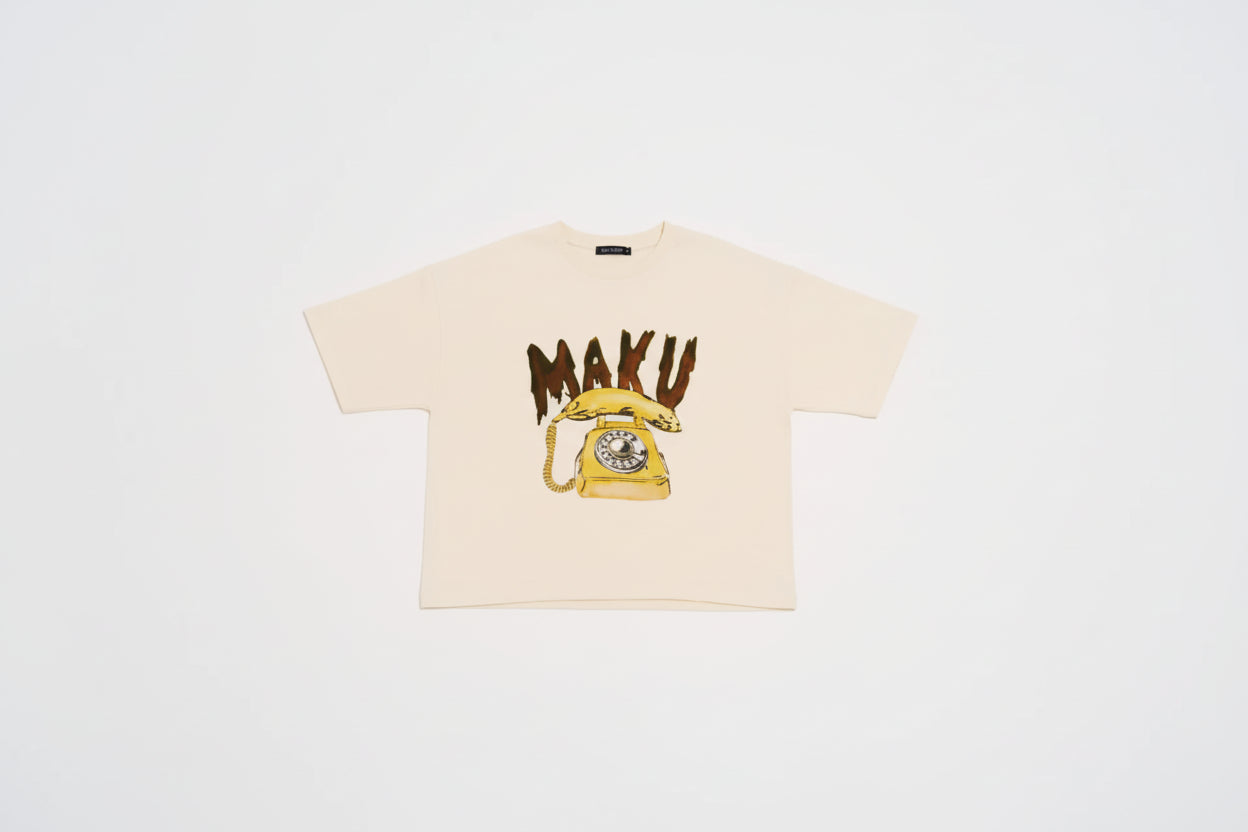 Flat lay Ivory Boxy tee with banana phone print