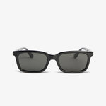 Black sunglasses with dark lenses on a white background
