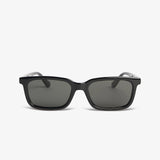 Black sunglasses with dark lenses on a white background
