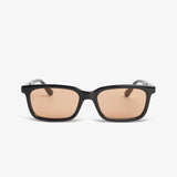 Black sunglasses with brown lenses on a white background