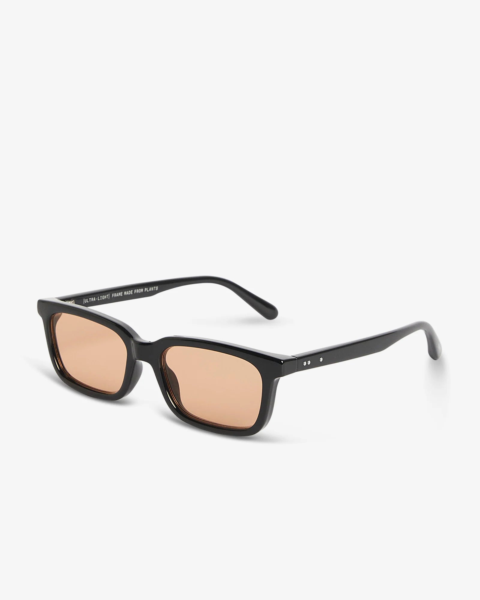 Sunglasses with black frame and brown lenses on a white background