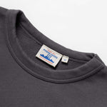 Gray sweatshirt with a visible brand label on a white background