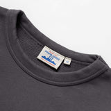 Gray sweatshirt with a visible brand label on a white background