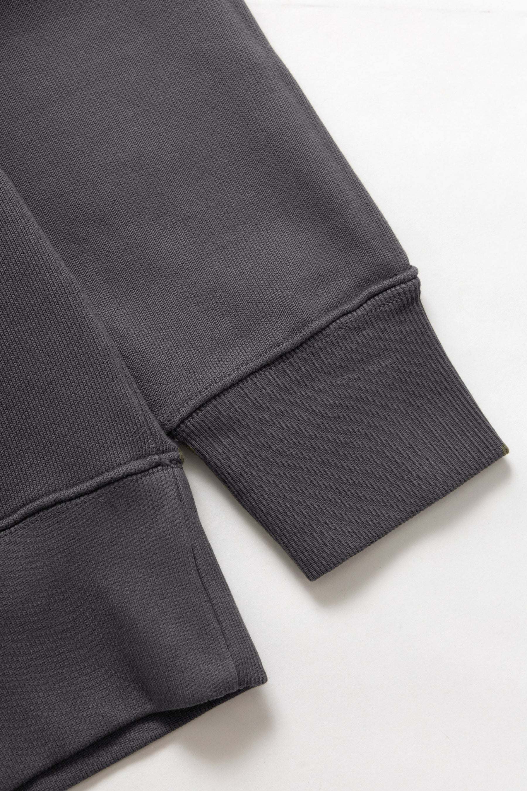 Dark gray sweatshirt on a white background