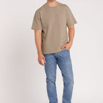 Man wearing Blue Jeans Beige top and denim cap on white Background