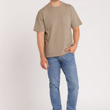 Man wearing Blue Jeans Beige top and denim cap on white Background