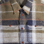 Plaid shirt with collar and buttons on a white background