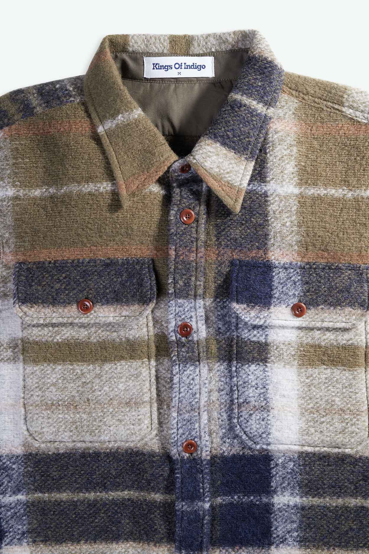 Plaid shirt with collar and buttons on a white background