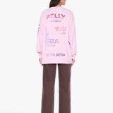 A model shown from the back wearing a light pink sweatshirt with colorful graphic text and dark brown wide-leg pants, photographed against a clean white background.