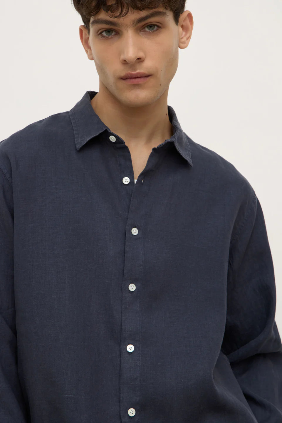 Man wearing a navy shirt