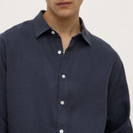 Man wearing a navy shirt