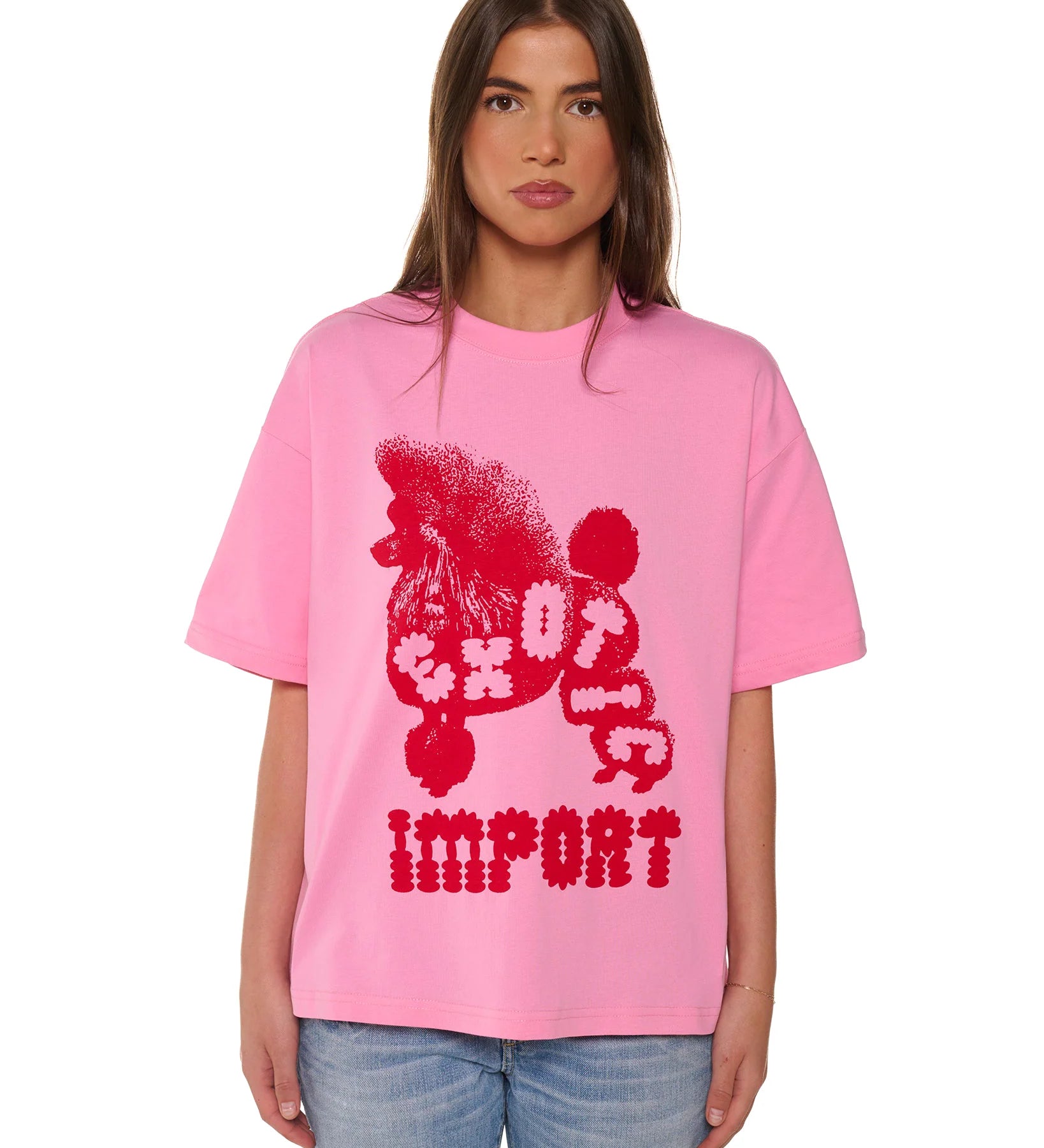 Person wearing a pink t-shirt with a red graphic design on a white background