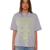 Person wearing a gray t-shirt with yellow text and graphics on a white background