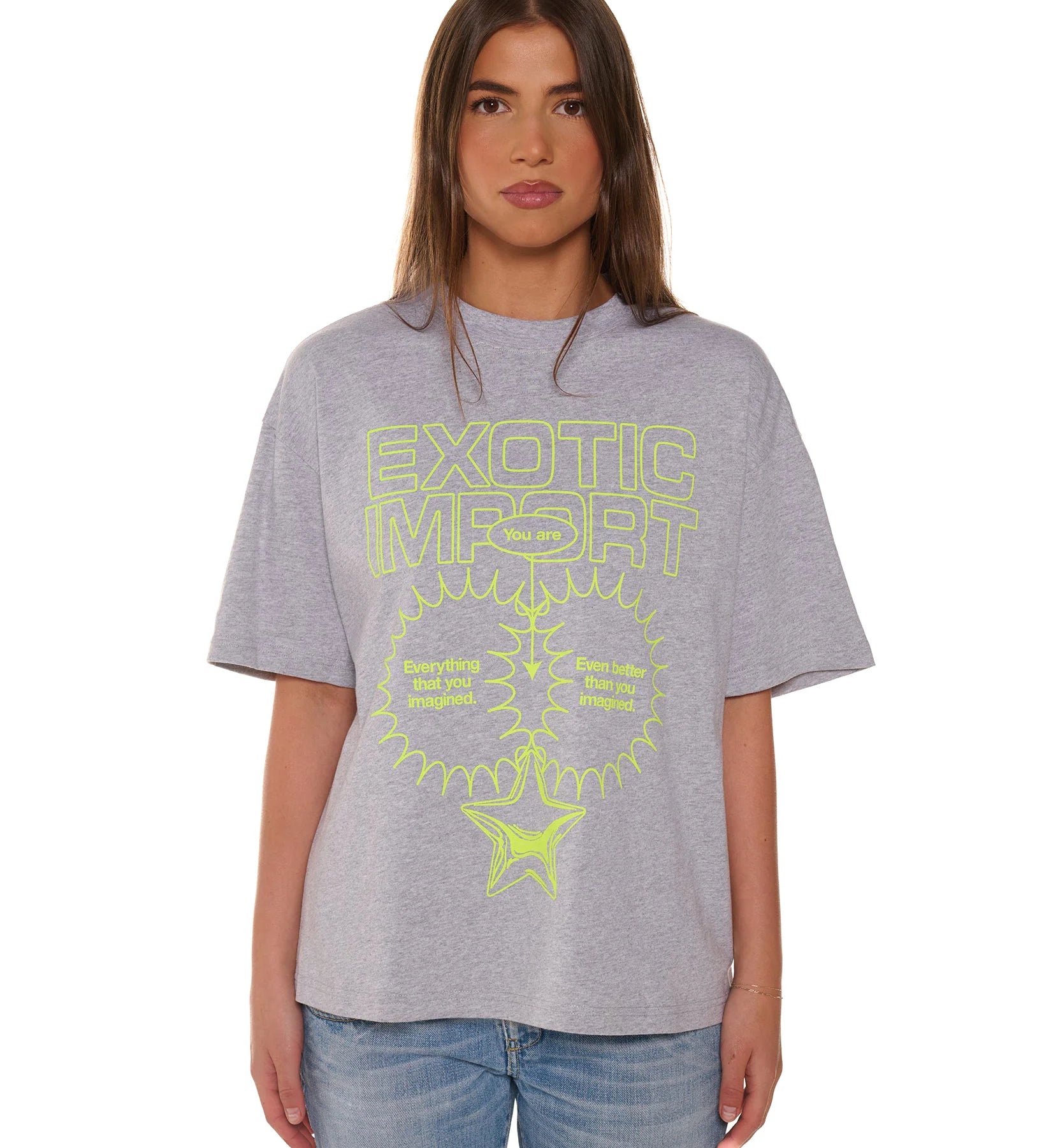 Person wearing a gray t-shirt with yellow text and graphics on a white background