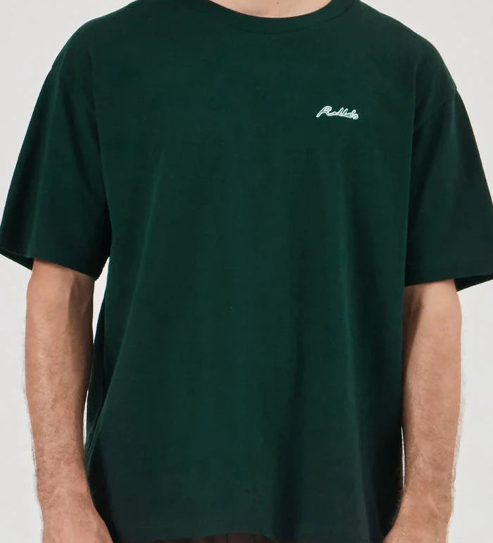 Person wearing a dark green t-shirt with a logo on a white background