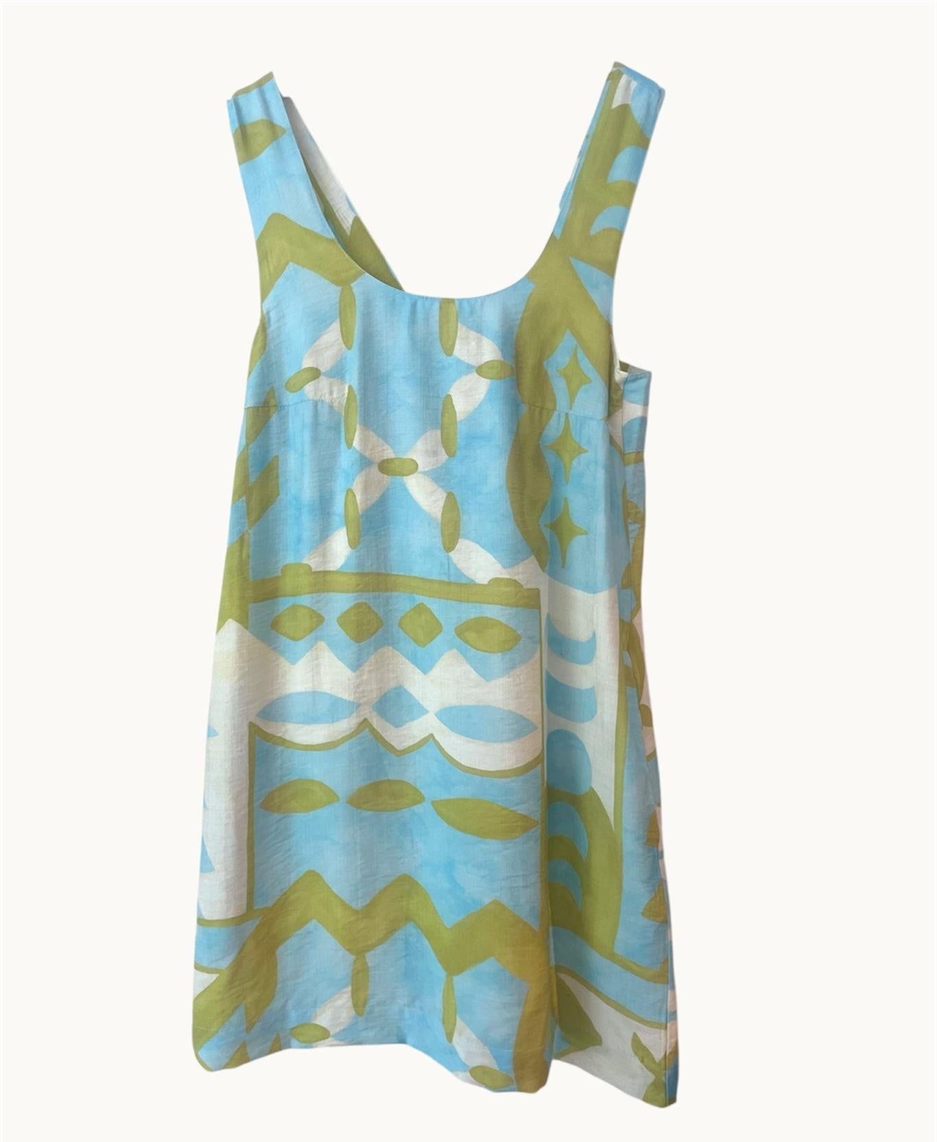 Blue and green patterned dress on a white background