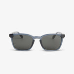 Sunglasses with blue frame and dark lenses on a white background