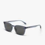 Sunglasses with a blue frame and dark lenses on a white background