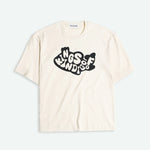 Beige t-shirt with black graphic design on a light gray background