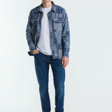 Man wearing a blue denim jacket and jeans on a white background