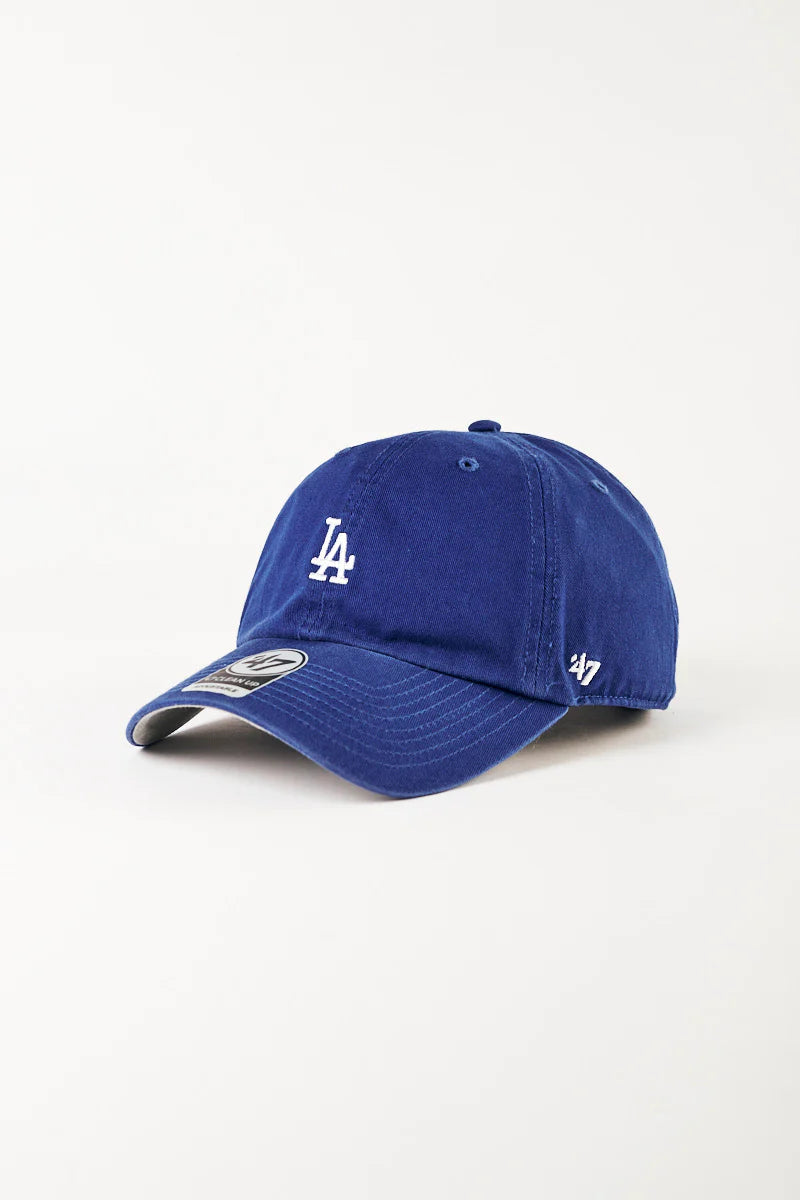 Blue baseball cap with a logo on a white background