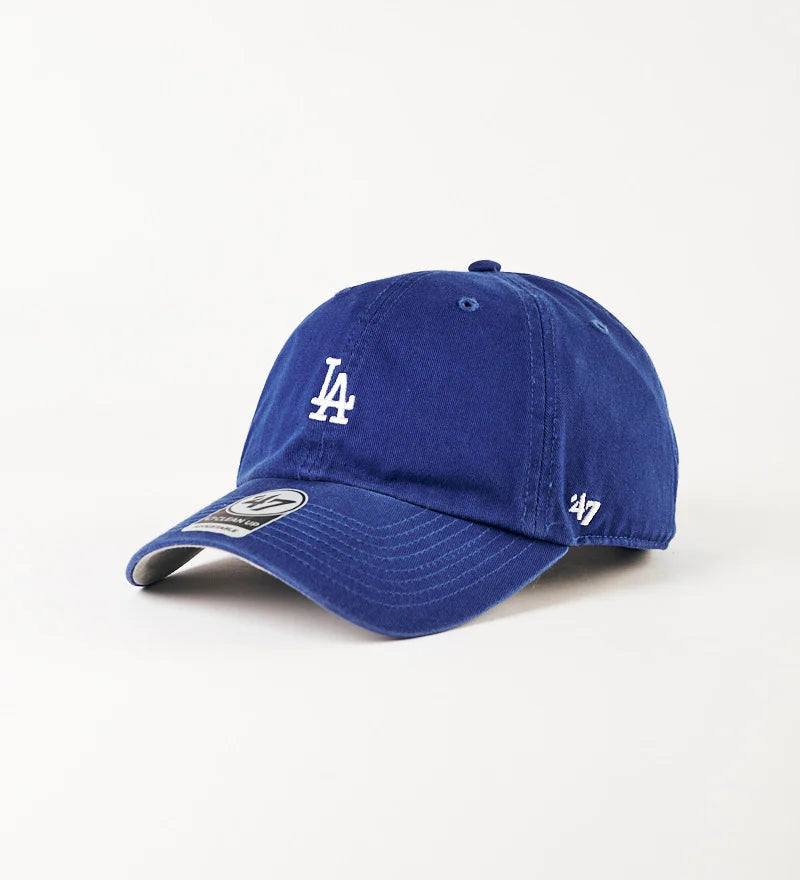 Blue baseball cap with a logo on a white background