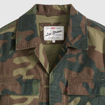 Camouflage jacket with Levi's label on a light gray background