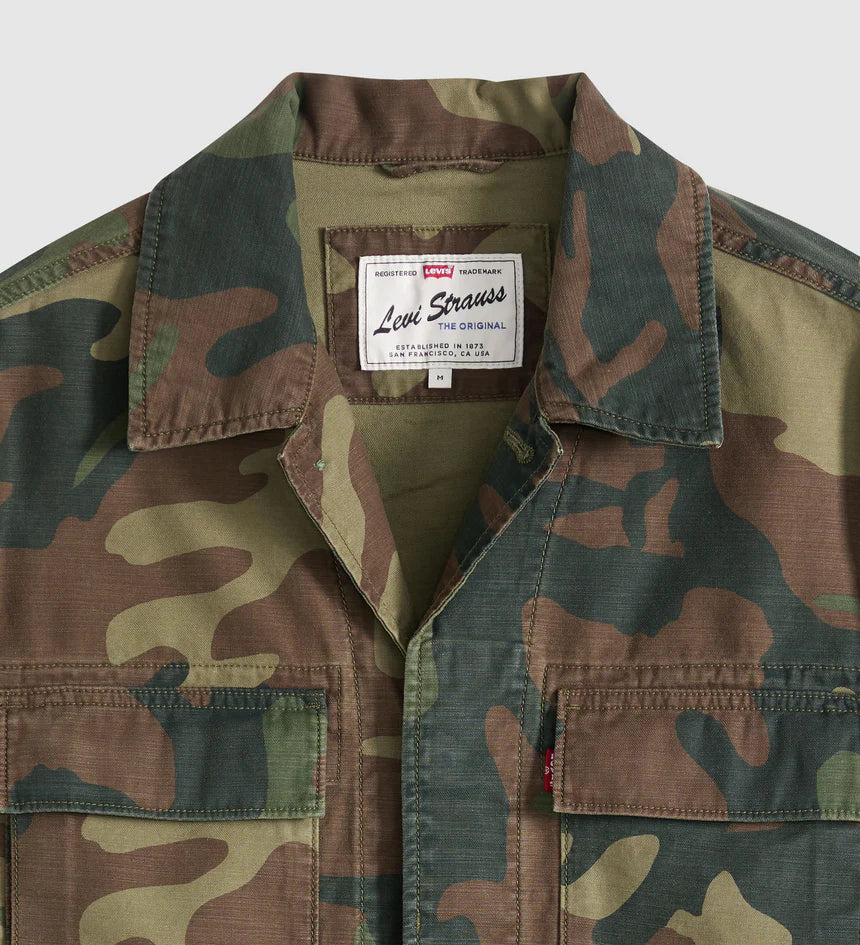 Camouflage jacket with Levi's label on a light gray background