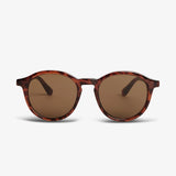 Round sunglasses with tortoiseshell frame and brown lenses on a white background