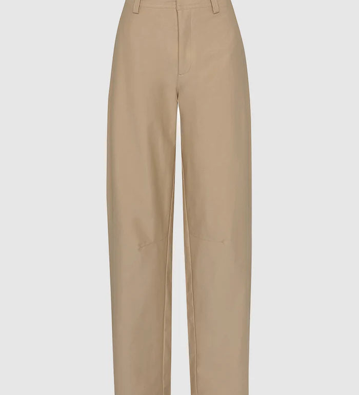 Beige pants on a light gray background