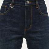 Dark blue jeans on a white background