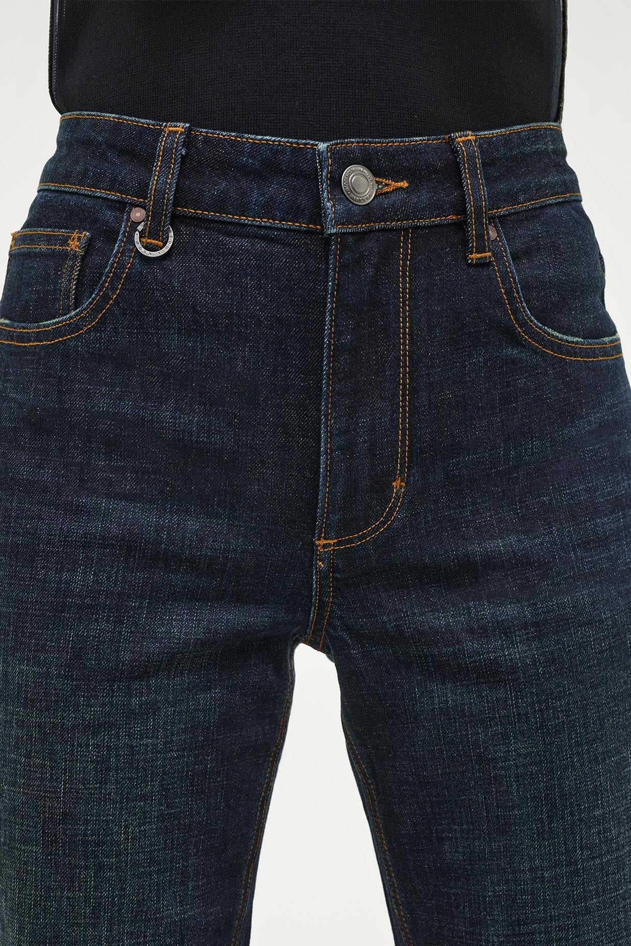 Dark blue jeans on a white background