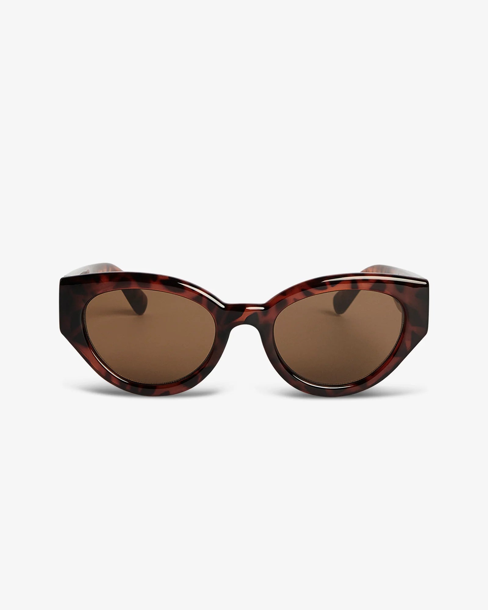 Sunglasses with tortoiseshell frame and brown lenses on a white background
