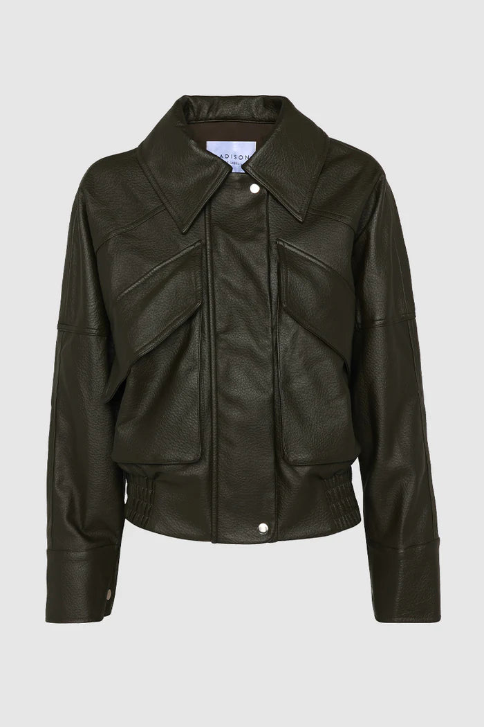 Forest leather jacket on a light gray background