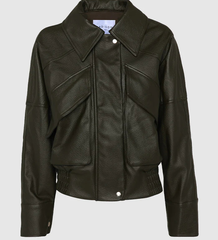 Forest leather jacket on a light gray background