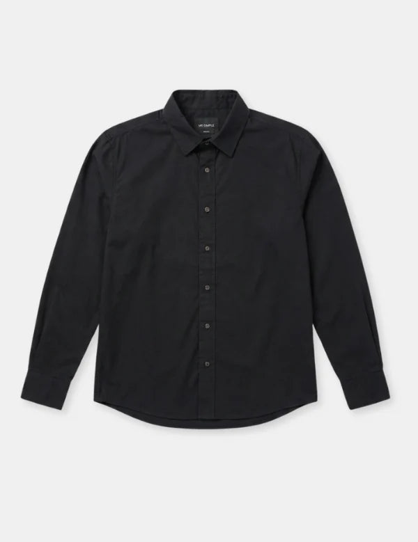A black long-sleeve button-down shirt with a classic collar, laid flat against a light gray background.